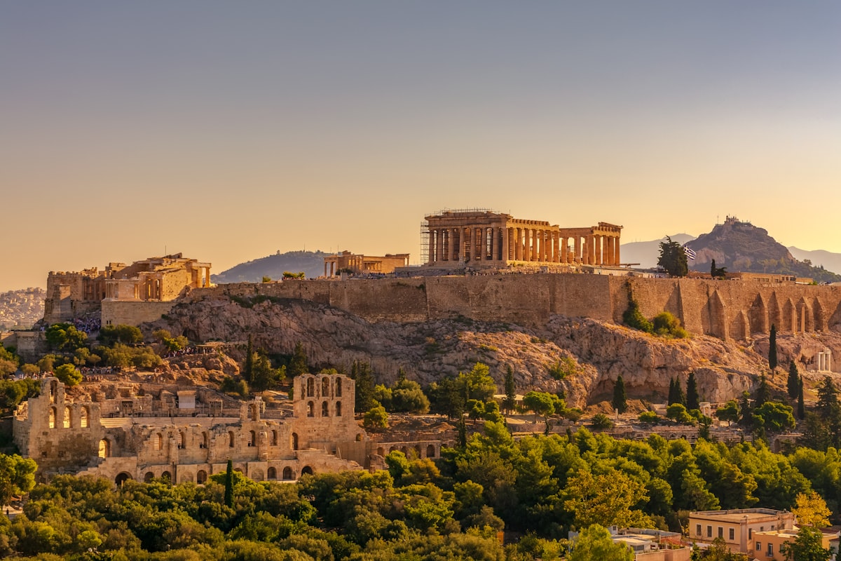 Dramatic Mediterranean landscape with ancient stone structures overlooking the Aegean Sea