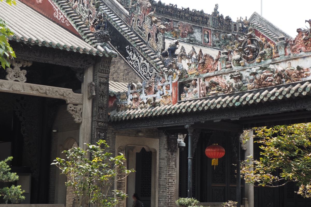 Ornate traditional Chinese roof decorations and carved stone facade of the Chen Clan Ancestral Hall in Guangzhou
